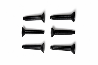 Set of six black screws on a white background